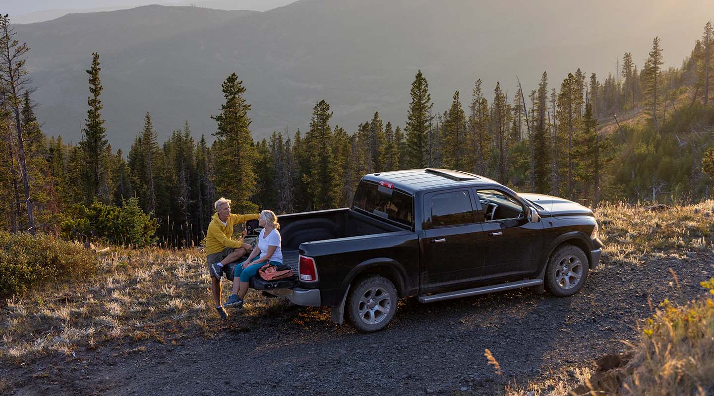 Senior couple rest in pick-up truck