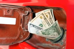 Saving at a pump showing dollars